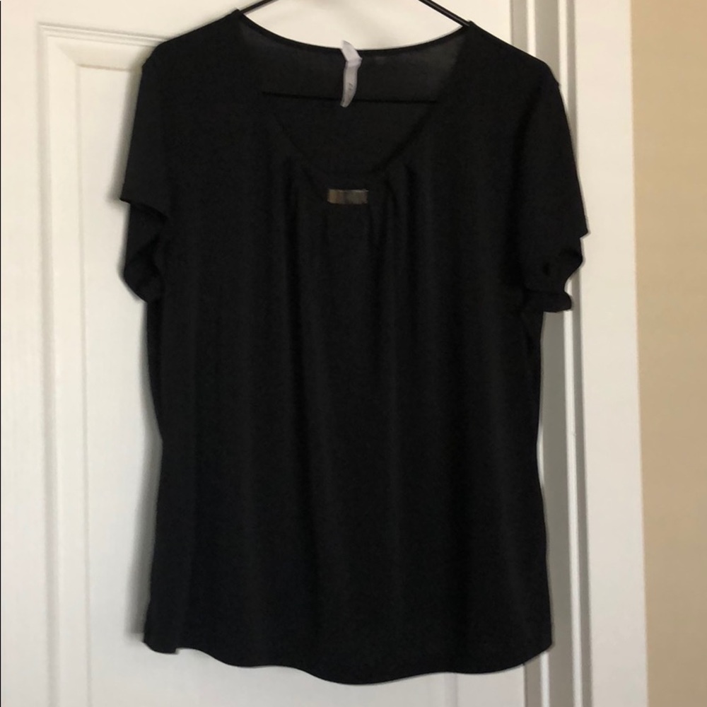Black blouse.